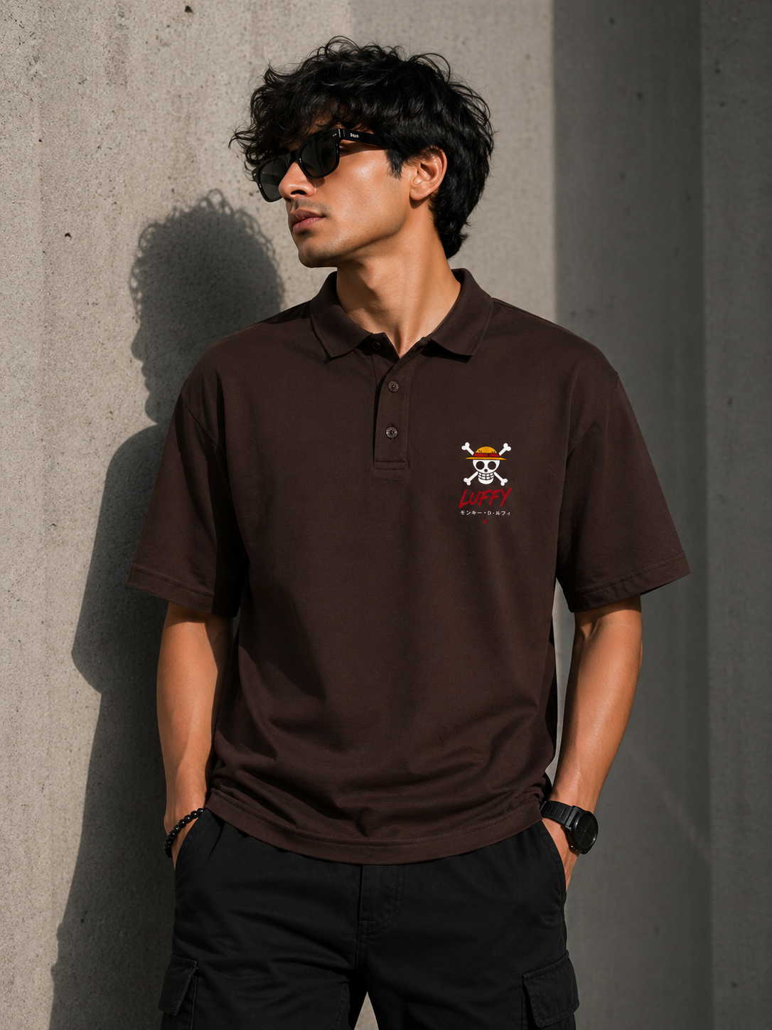 Lifestyle shot of a coffee brown polo t-shirt featuring a high-density chest graphic and ribbed collar.
