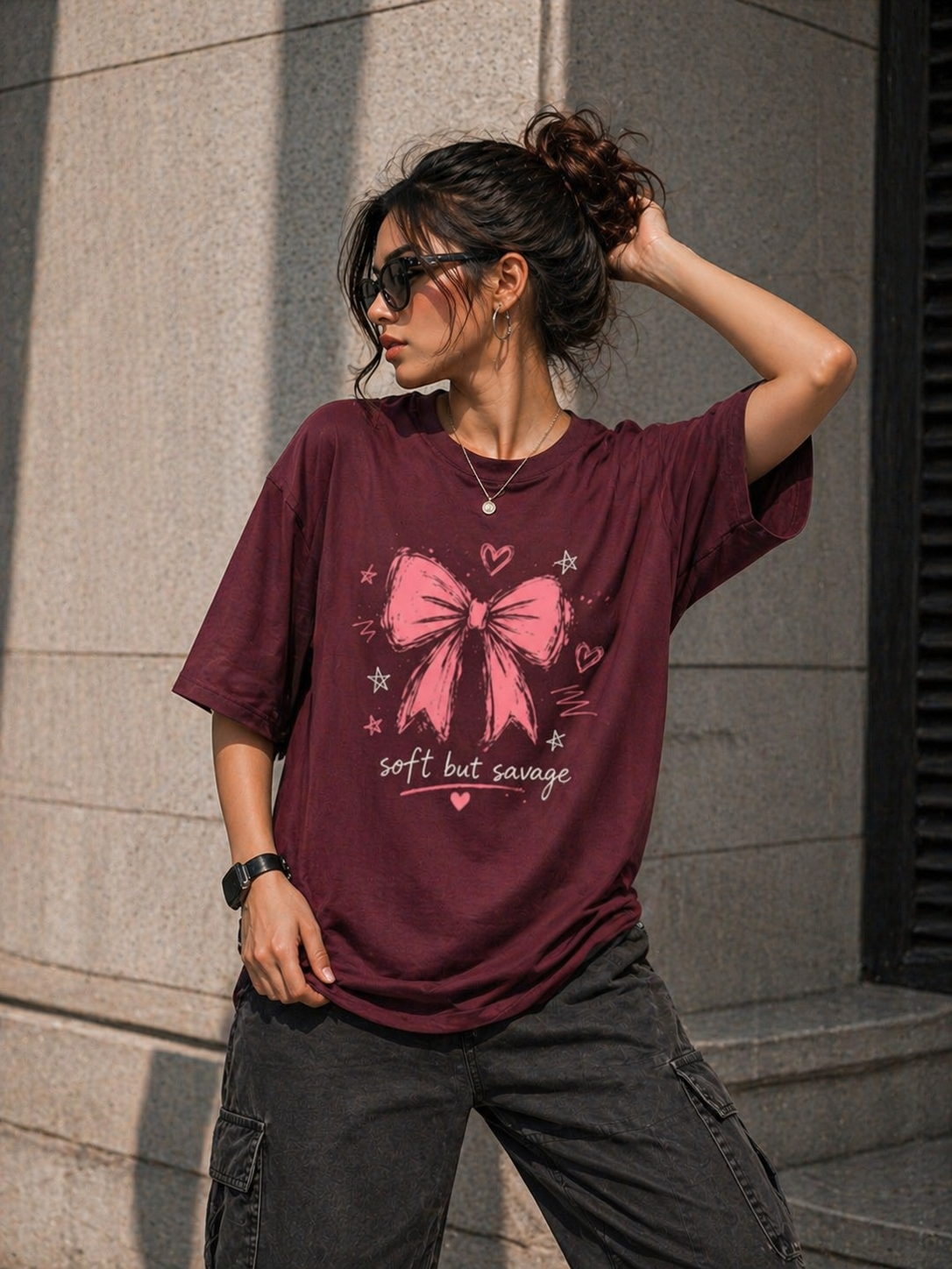 Detailed shot of the high-density 'Soft But Savage' pink bow print on heavyweight 100% cotton fabric.