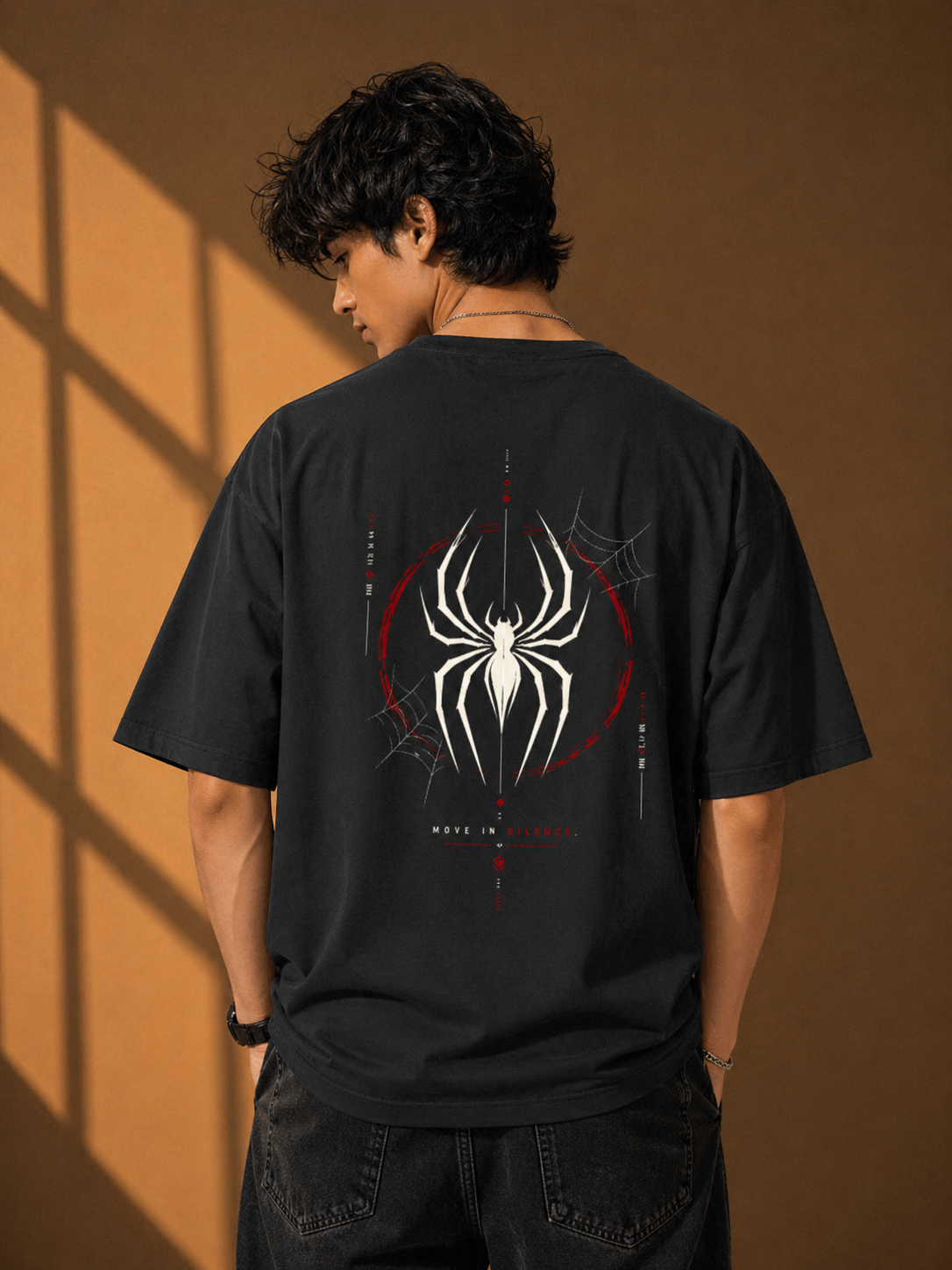 Back profile of the Maroon heavyweight oversized tee showcasing the detailed red and white spider artwork.