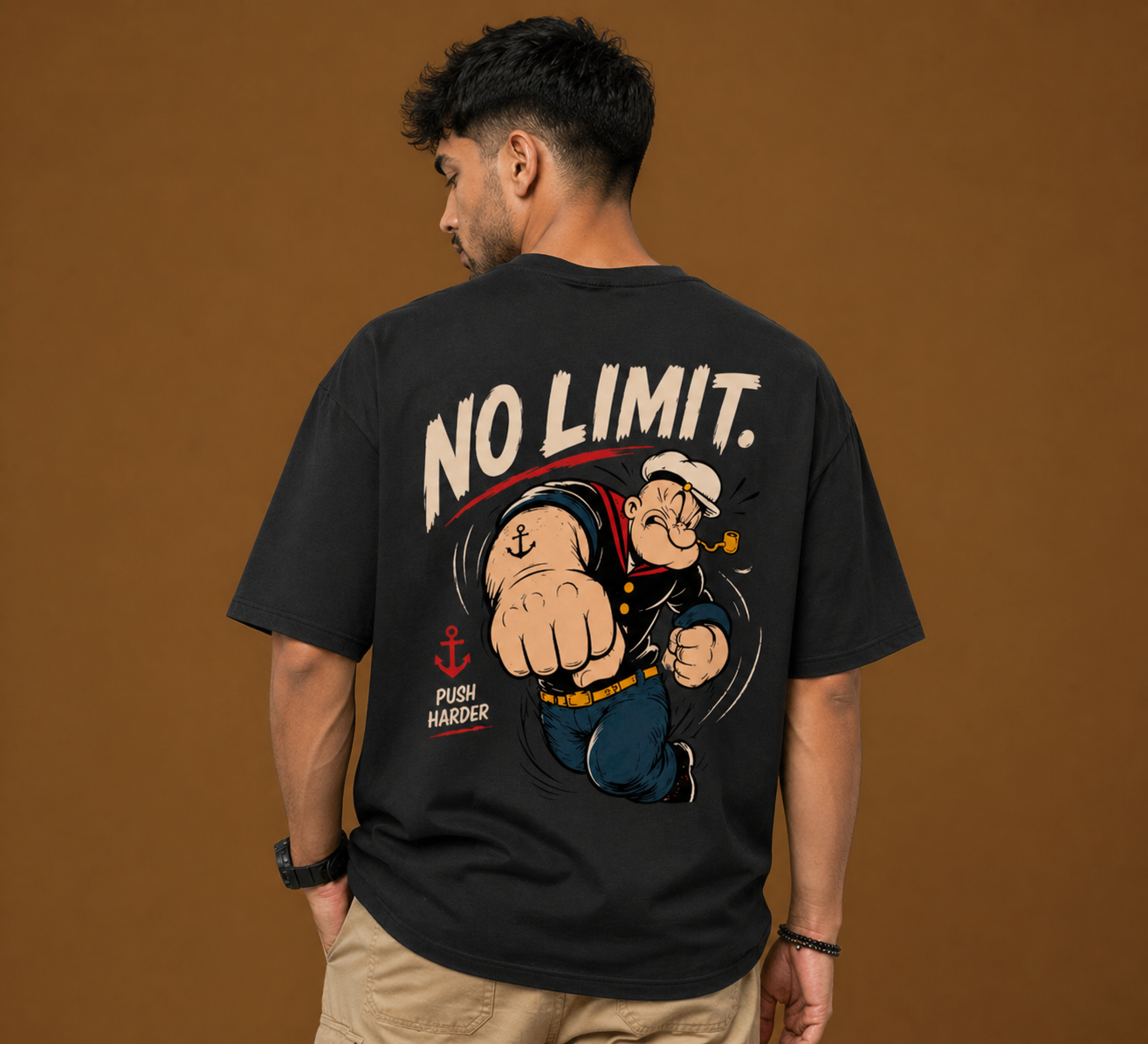 Back view of a black heavyweight oversized t-shirt with a bold 'No Limit' Popeye graphic print.