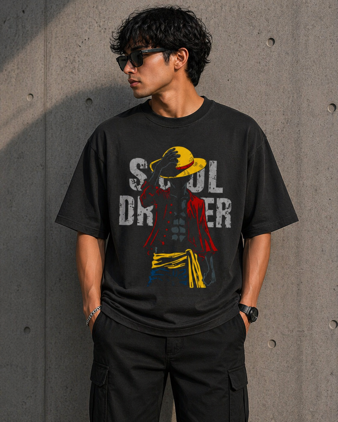 Front view of a black heavyweight oversized t-shirt with a bold Soul Driver graphic and iconic yellow hat art.

