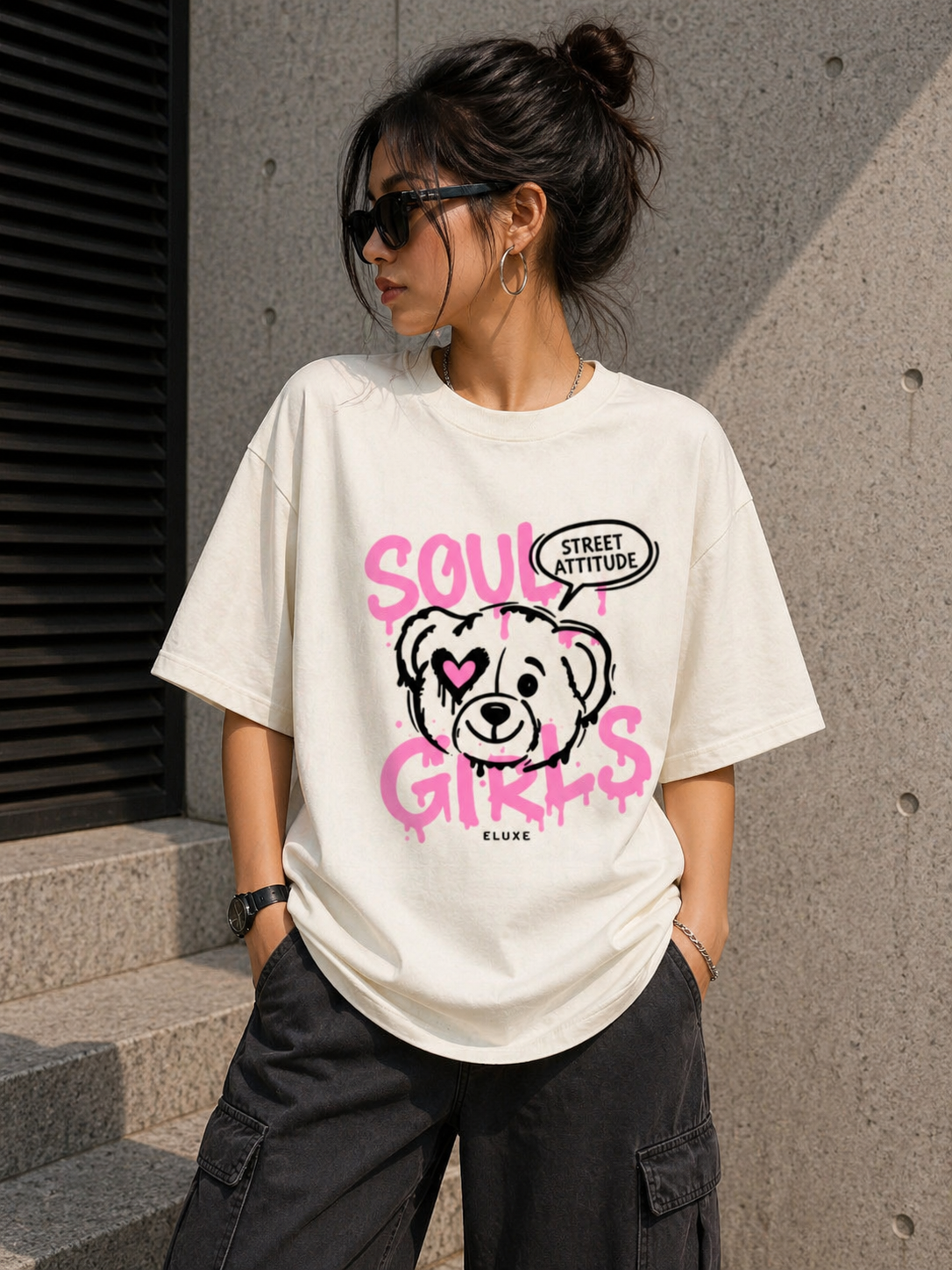 view of an Off-White heavyweight oversized t-shirt with a cute teddy bear graphic and pink 'Soul Girls' lettering.
