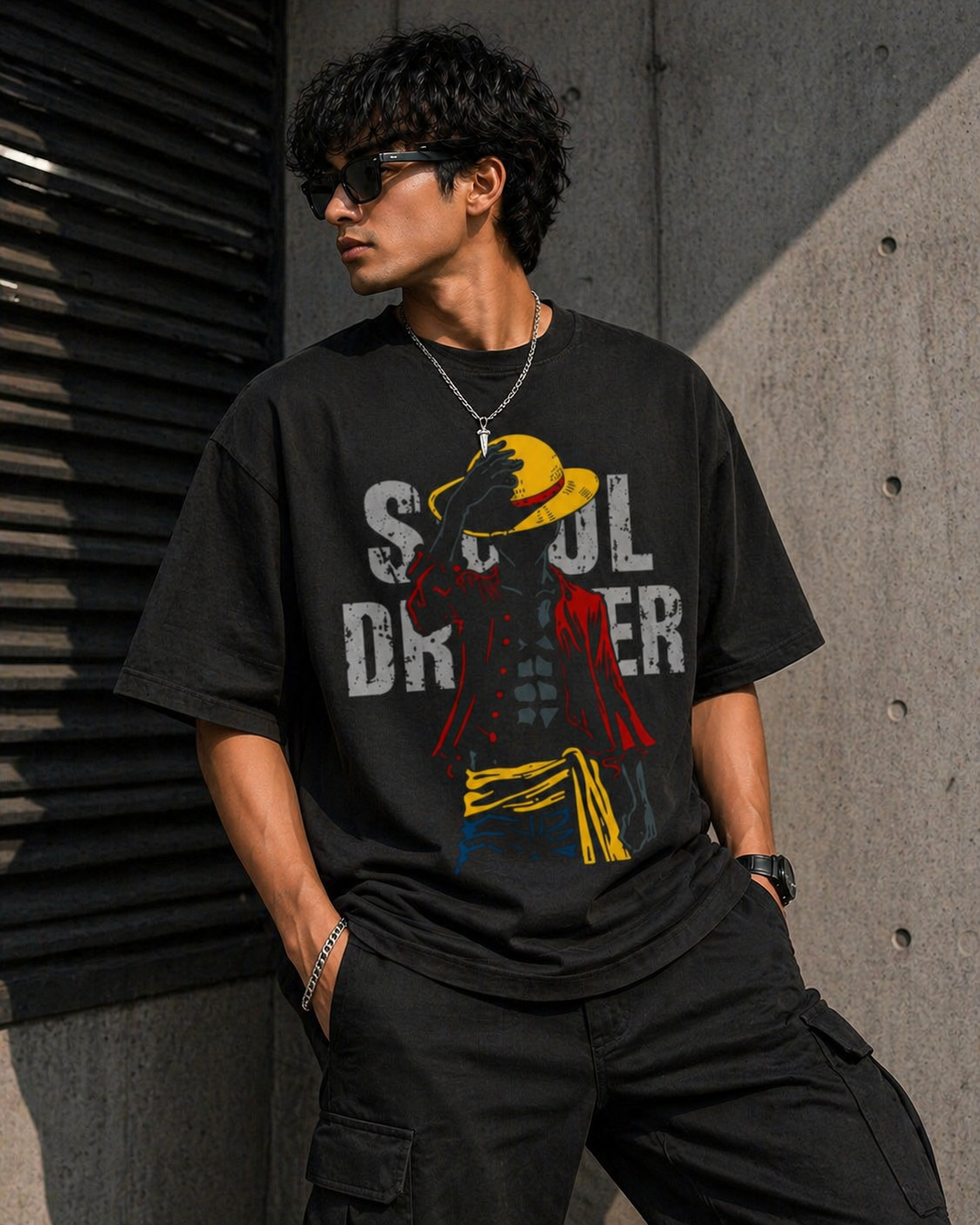 Model wearing the black Soul Driver oversized tee, showcasing the relaxed drop-shoulder fit and urban silhouette.
